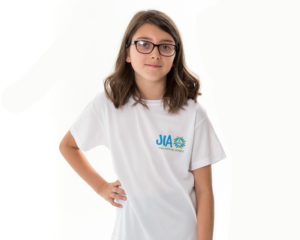 Child wearing JIA t-shirt